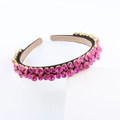 Detail shot of luxury headband with double-row magenta rhinestones and gold prong setting - Rose Red Style (F)