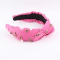 Detail of rose pink satin headband featuring white pearls and purple crystal embellishments - Rose Pink