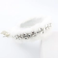 Detailed macro of white faux fur headband with crystal rhinestones and silver tassels - White with Tassel