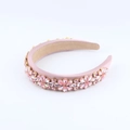 Detail of pink satin headband with 3D floral rhinestone patterns and inner non-slip layer - Pink