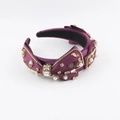Detailed macro shot of purple satin headband with crystal bow and pearl accents - Dark Purple Heavy Craft Bow Style / Purple