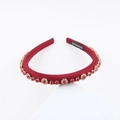 Detail of handmade red rhinestone headband with gold claw settings and satin fabric - Red With Red Rhinestones (G)