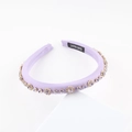 Detailed view of light purple satin headband with rhinestones and handmade label - Lavender With Purple Rhinestones (H)