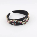Detail of velvet padded headband with colorful rhinestones in a vintage floral pattern - Colorful