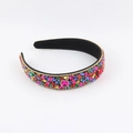 Baroque wide headband with colorful rhinestones and gold trim on black velvet base - Multicolor