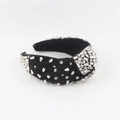 Close-up of black velvet headband featuring hand-sewn sparkling crystal rhinestones - Black