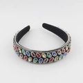 Dettaglio del cerchietto con motivo a foglie con strass colorati e base in velluto - Stile Multicolore (A)