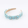 Detail view of sky blue baroque headband with shimmering crystals and silk fabric - Sky Blue