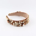 Detailed close-up of brown velvet headband with colorful crystals and hanging pearl - Amber Style (A)