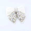 Detail view of Hepburn style black velvet bow hair claw with rhinestones and pearls - Heavy Rhinestone Cream Velvet Style (G)