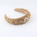 Detailed close-up of velvet headband with gold chains and sparkling crystal flower embellishments - Champagne Style (D)