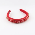 Detailed close-up of handmade red gemstone headband with gold diamond chain accents - Red