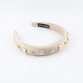 Detail of satin sponge headband with crystal butterfly and handmade label - Champagne