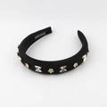 Detail of black padded headband featuring crystal butterflies and floral decorations - Black