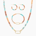 Detail view of Bohemian jewelry set featuring orange heishi beads and gold oval clasp - Jewelry Set (NK7006-00-31)
