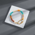 Handmade bohemian beaded necklace with multi-color glass beads and large gold metal carabiner - Bracelet