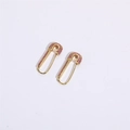 Close-up of gold paperclip earrings with pink zircon micro-pave detailing - 14K Gold Red Zircon