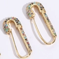 Macro view of gold safety pin earrings with rainbow pave set cubic zirconia crystals - 14K Gold Multi-Color Zircon