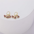 Detail of 14K gold-plated huggie earrings with three magenta heart-shaped cubic zirconia - Rose Red (ES0220)