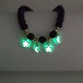 Black onyx beaded bracelet with glowing star and moon pendants in fluorescent green - Star Moon Green Glow