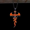 Detail of gothic skull pendant with silver wings and orange flame enamel work - Leather Cord Orange Red Light
