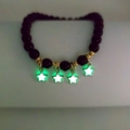 Luminous black onyx bead bracelet with gold accents and five glowing star charms - Star Green Glow