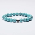 Unisex 8mm turquoise beaded bracelet featuring hematite spacer on grey background - Lake Blue Turquoise