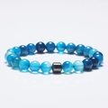 Blue beaded bracelet with deep tones and a grey hematite spacer bead for men and women - Striped Blue Agate