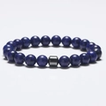 Lapis lazuli beaded bracelet with hematite cylinder bead and natural stone textures - Lapis Lazuli