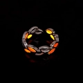 Macro dell'anello a foglia arancione luminoso con effetto fluorescente nell'oscurità - Argento Bagliore Arancione-rosso