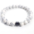 8mm white turquoise beaded bracelet with black hematite hexagonal bead centerpiece - Howlite