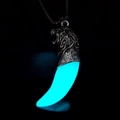 Luminous wolf tooth necklace with silver lion head showing bright blue glow in the dark - Antique Silver Aqua Glow