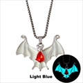 Luminous bat wing pendant necklace with red teardrop gem showing light blue glow effect - Silver Teal Glow