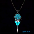 Macro detail of bird skull pendant with blue luminous rune and silver metal finish - Cyan Glow Pendant (3#)