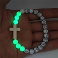 Glow-in-the-dark luminous bead bracelet with marble pattern beads and a white cross charm - White Turquoise (Green Luminous)