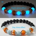 Luminous pumpkin glass bracelet with volcanic stone beads showing night and day effect - 1# Luminous Blue
