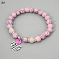 Detail of the Super Mom heart charm and pink marble beaded bracelet for Mother's Day - Pink Turquoise Silver Blue-Green Glow