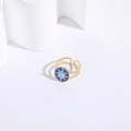 Detailed macro of golden evil eye ring with blue enamel and twisted band texture - Adjustable Open / Sunburst Twisted Style (JZ0098-款式三)