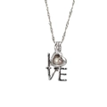 Zilveren LOVE hanger ketting met hartvormige kooi en natuurlijke roze parel variant - LOVE Stijl
