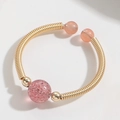 Vintage 14k gold-filled copper wire ring featuring a natural pink strawberry quartz stone - Strawberry Quartz Style