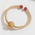 Vintage 14k gold-filled wire wrapped open ring featuring a yellow natural stone bead - Rutilated Quartz Style