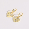 Detail of heart shaped 14K gold plated earrings featuring sparkling star set zircons - Hoop Style / Heart Zirconia Earrings (ES0171)