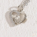 Silver heart necklace with family silhouette and sparkling cubic zirconia stones - Heart White Gold Plated