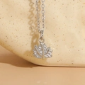 Silver maple leaf pendant necklace with shimmering cubic zirconia and 14K gold plating - Maple Leaf (Silver)