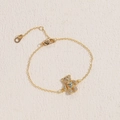 Goldenes Armband mit funkelndem Bärenanhänger, besetzt mit Zirkonia und bunten Edelsteinen - Bunt