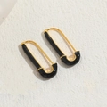 Minimalist gold and black enamel safety pin earrings with a modern geometric design - Black