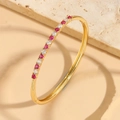 Elegant gold bangle featuring a pattern of alternating red and white round zircons - Rose Red Zircon Bangle