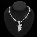 Silver iced out lightning bolt pendant with tennis chain necklace on neck model - Silver Tone Pendant And Tennis Chain