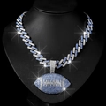 Macro detail of iced out Cuban chain with blue rhinestones and football pendant - Silver Light Blue Pendant And Cuban Chain