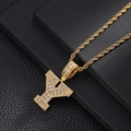 Macro shot of gold letter Y pendant with cubic zirconia on a classic twisted rope chain - Letter Y / Rope Chain Necklace / Gold